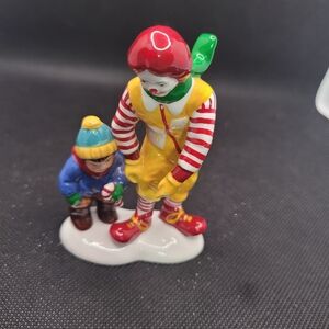 Colorful Clown and Child Figurine